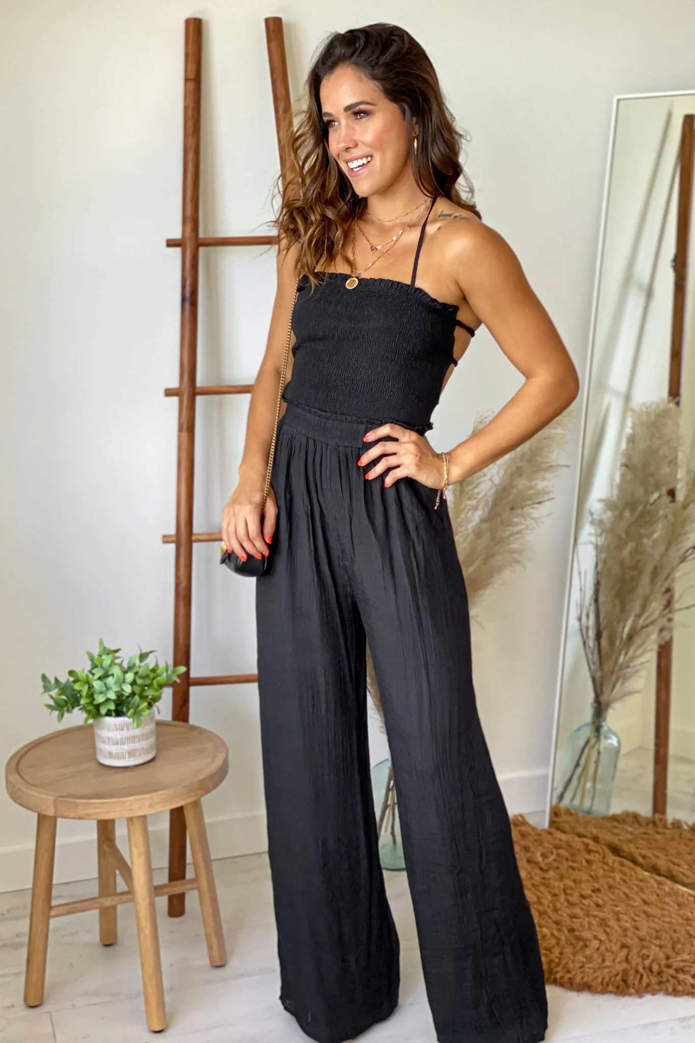 Black Strapless Jumpsuit With Smocked Top