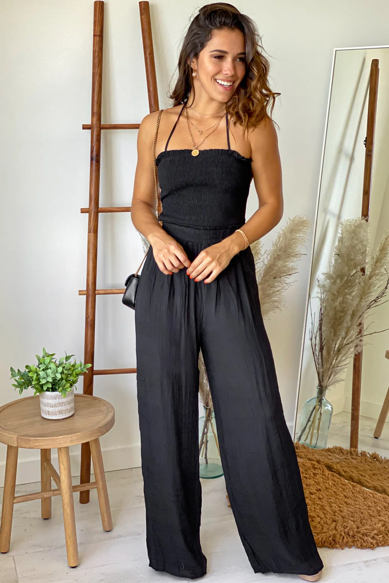 Black Strapless Jumpsuit With Smocked Top